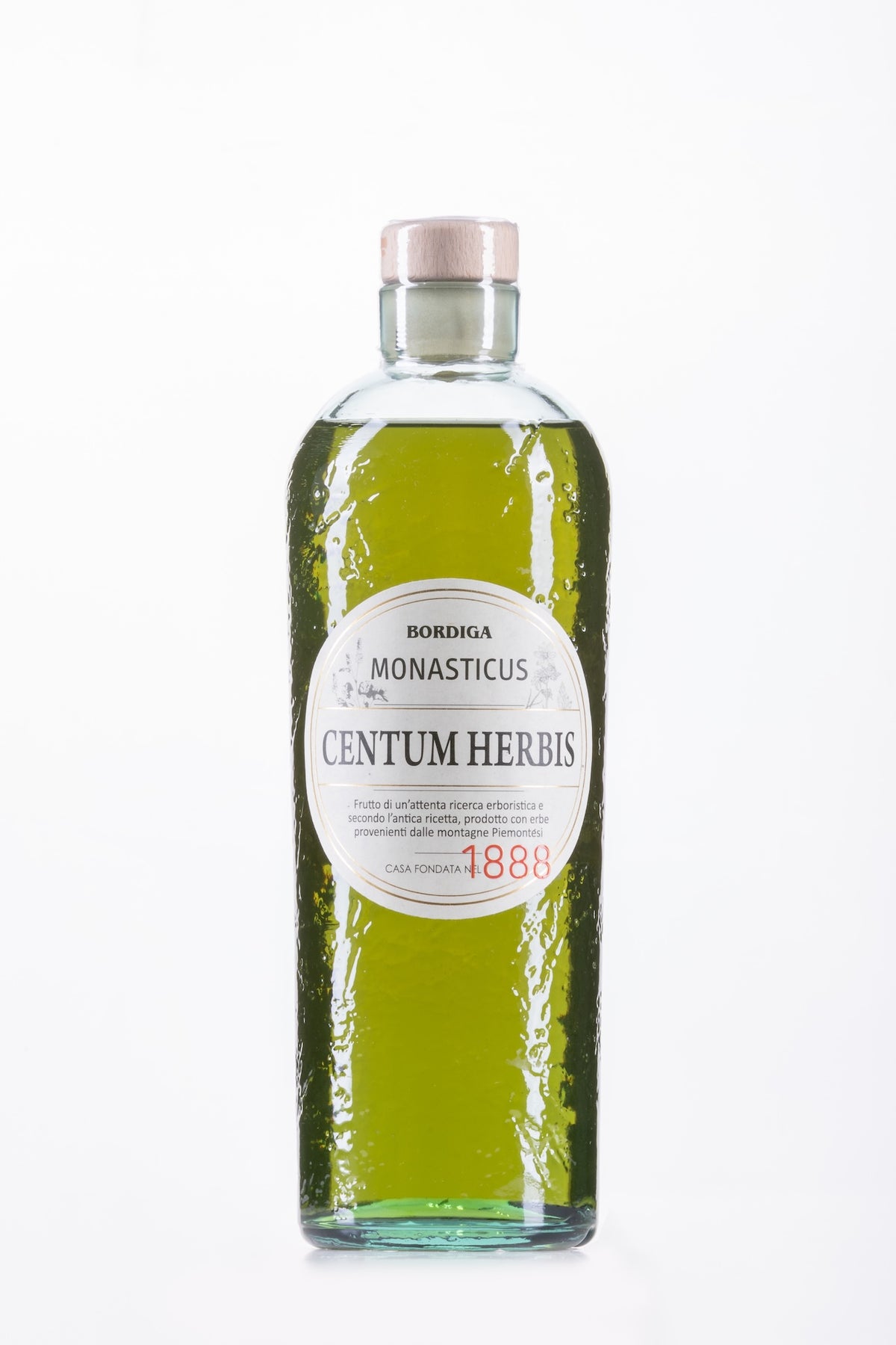 Grüne Glasflasche Amaro Centum Herbis Monasticus von Bordiga mit Naturkorken und geprägter Oberfläche.