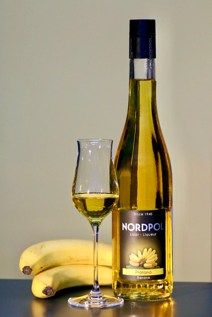 Bananen Likör "Nordpol" aus Spanien mit Glas und Banane