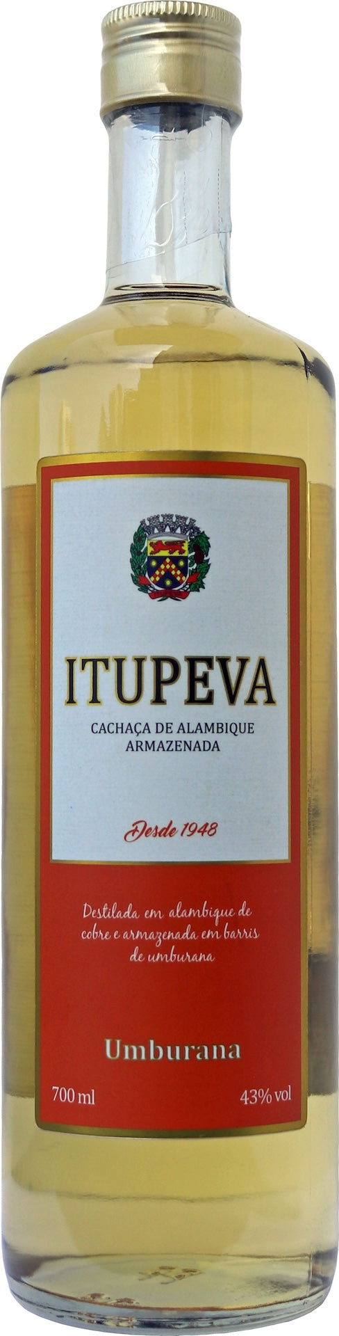 Flasche Itupeva Cachaça Umburana, 700 ml, goldene Spirituose mit rotem Etikett und Stadtwappen, 43 % Vol., goldener Schraubverschluss.