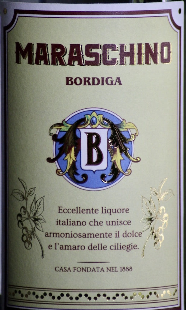 Etikett der Maraschino Likörflasche von Bordiga mit Wappen und italienischem Beschreibungstext.