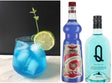 Blauer Blue Gin Blues Cocktail mit Limettenscheibe, daneben Blue Curacao Sirup von Sanz und Blue Gin „Q“ Flasche.
