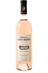 Flasche Château de Saint Martin Grande Réserve Rosé, Cru Classé, Côtes de Provence, mit hellrosa Farbe und hellem Etikett.