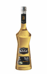 Holunderblütensirup Sanz 0,7L in eleganter Glasflasche mit schwarzem Etikett und goldgelbem Sirup.