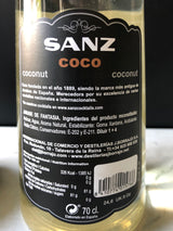 Nahaufnahme des Etiketts der Kokossirup-Sanz-Flasche mit Zutatenliste, Nährwertangaben, Barcode und Herstellerinformationen.