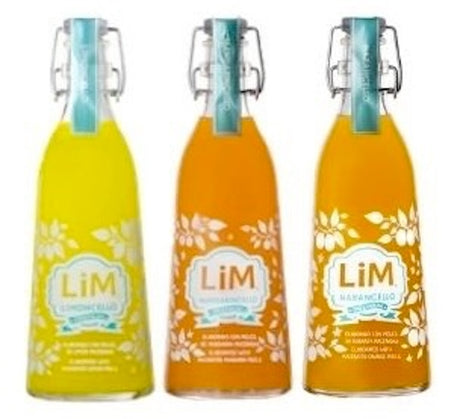 Lim Zitrusliköre Set mit Limoncello, Mandarincello und Narancello in drei schlanken Flaschen mit Bügelverschluss.