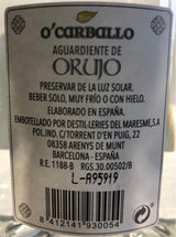 Rücketikett von O’Carballo Orujo mit Herstellerangaben, Serviervorschlag und Adresse der Destillerie in Arenys de Munt, Spanien.