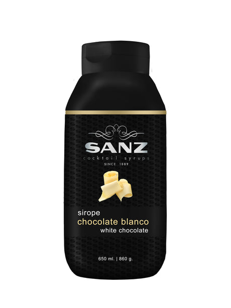 Weiße Schokolade Sirup Sanz in einer schwarzen 650-ml-Flasche mit Abbildung von Schokoladenraspeln auf dem Etikett.